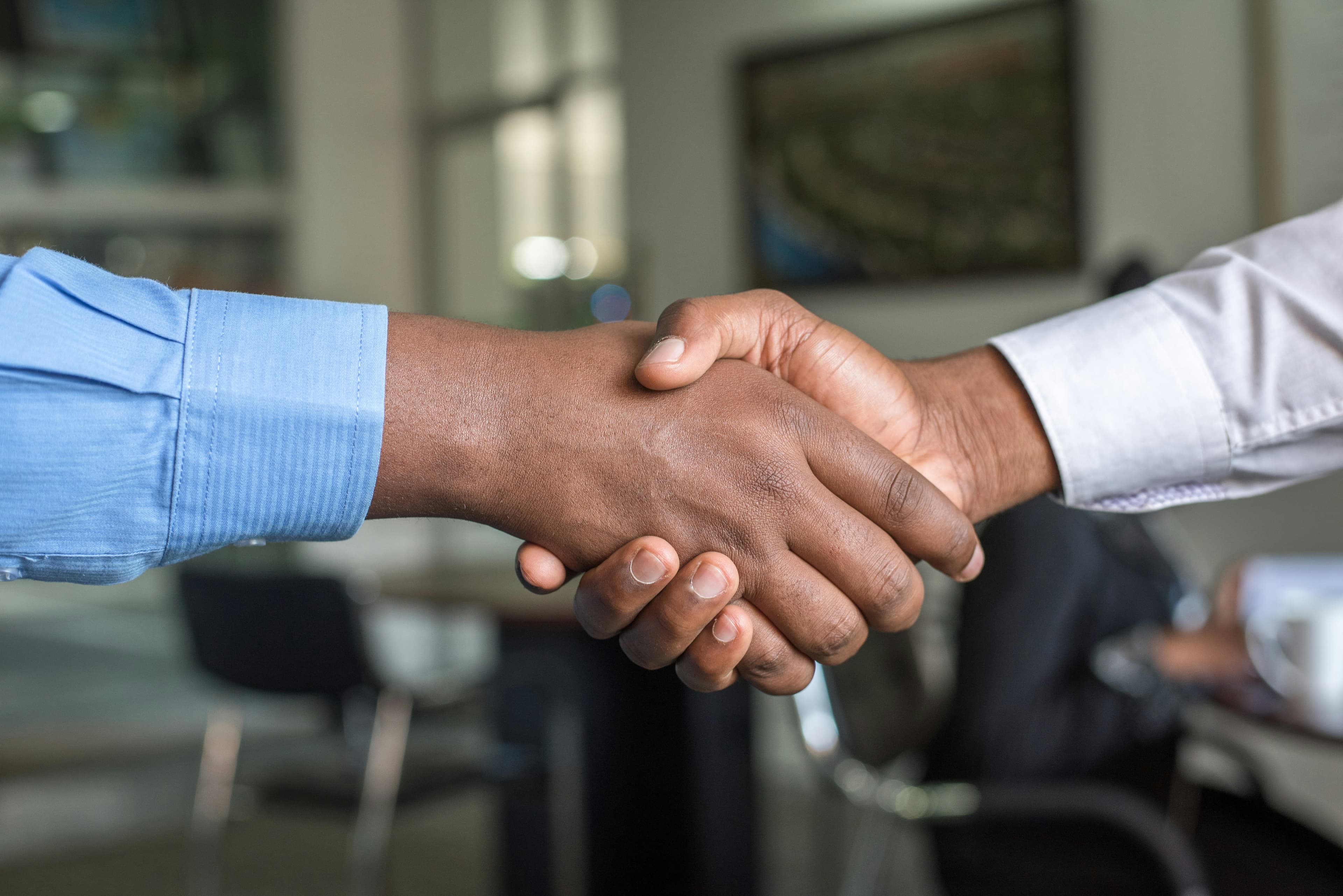 Business handshake — Stark Legal client engagement